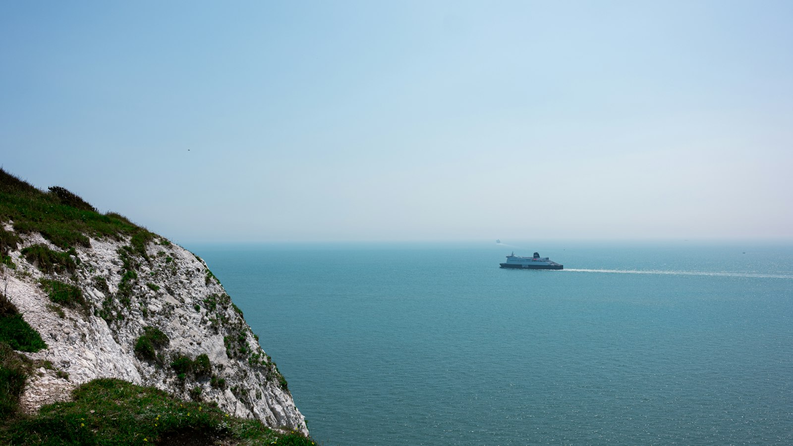Cross-Channel ferry sailing past the white cliffs of Dover