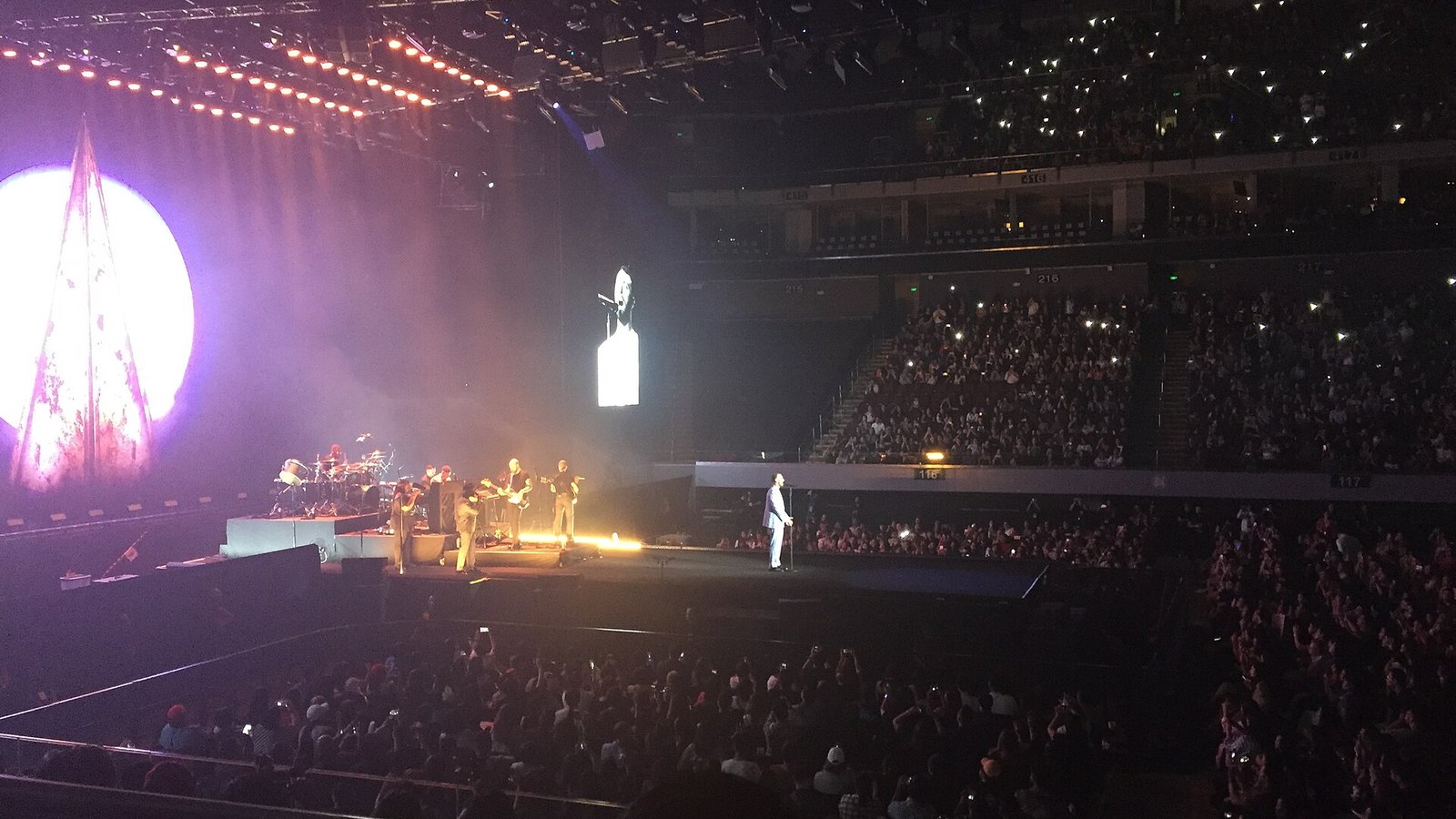 Sam Smith performing on an arena stage during The Thrill of It All tour, the kind of venue the London Coliseum residency has replaced
