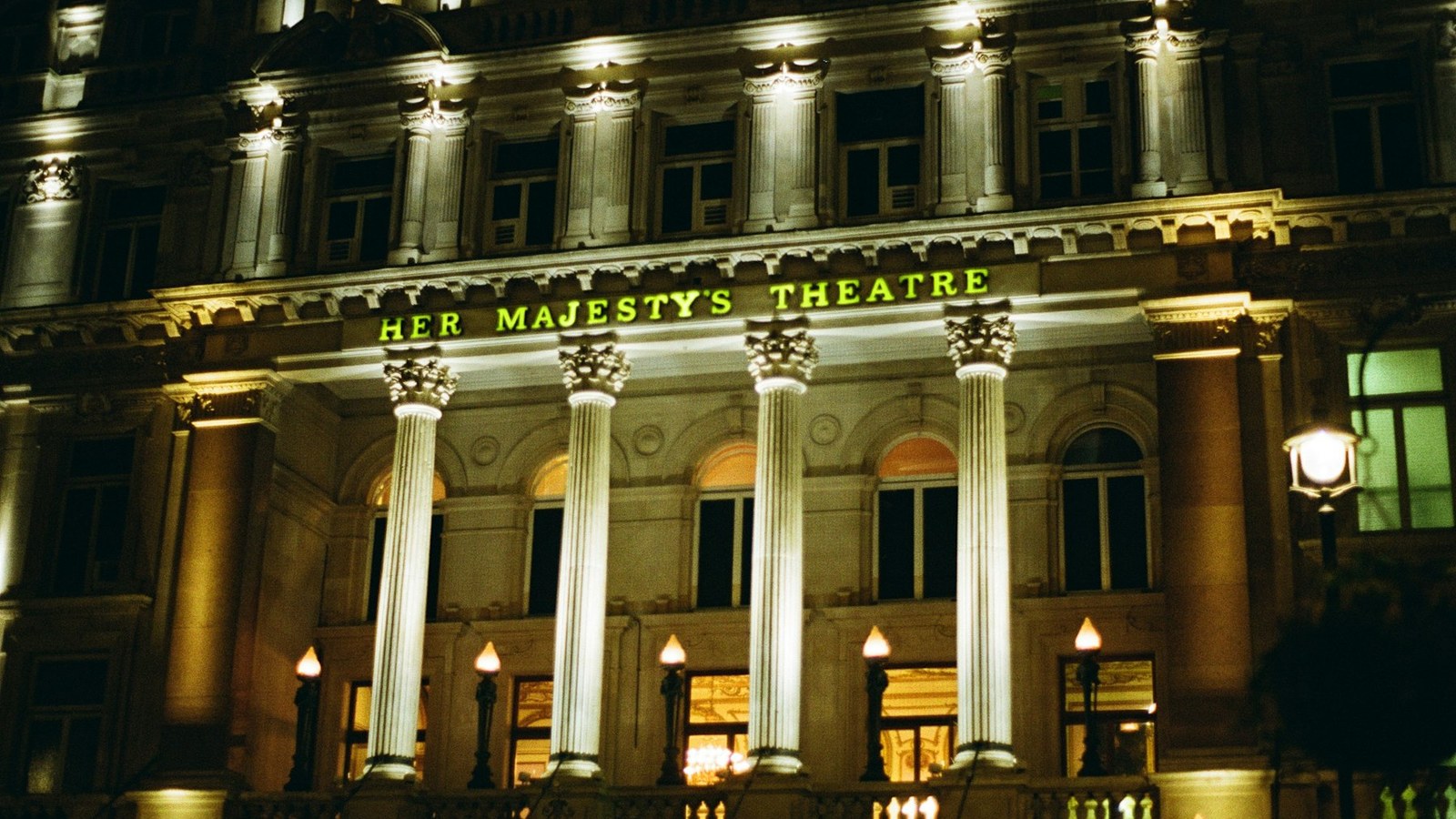 West End autumn 2026: Her Majesty's Theatre lit up at night on Haymarket