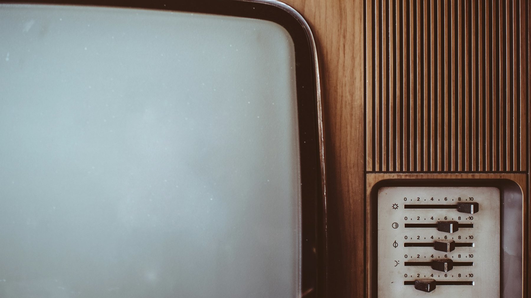 A vintage television set with wooden casing, a nod to how Britain watches documentaries