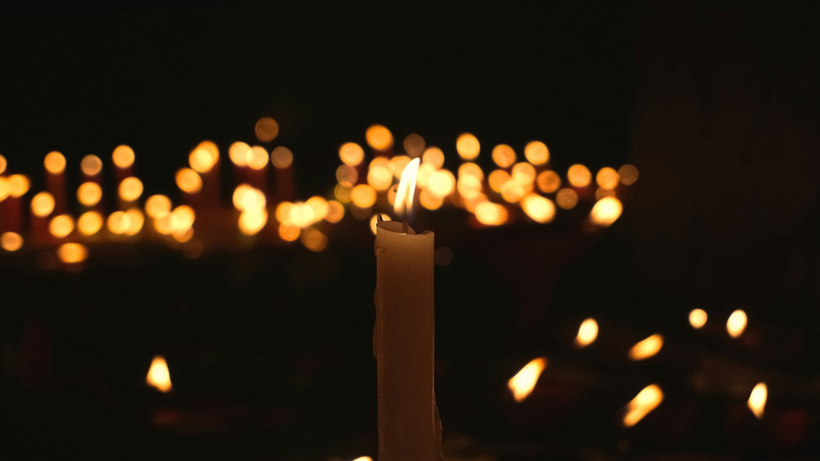 Candle burning in a dark room, a mood that suits the paranoia of Celebrity Traitors series 2