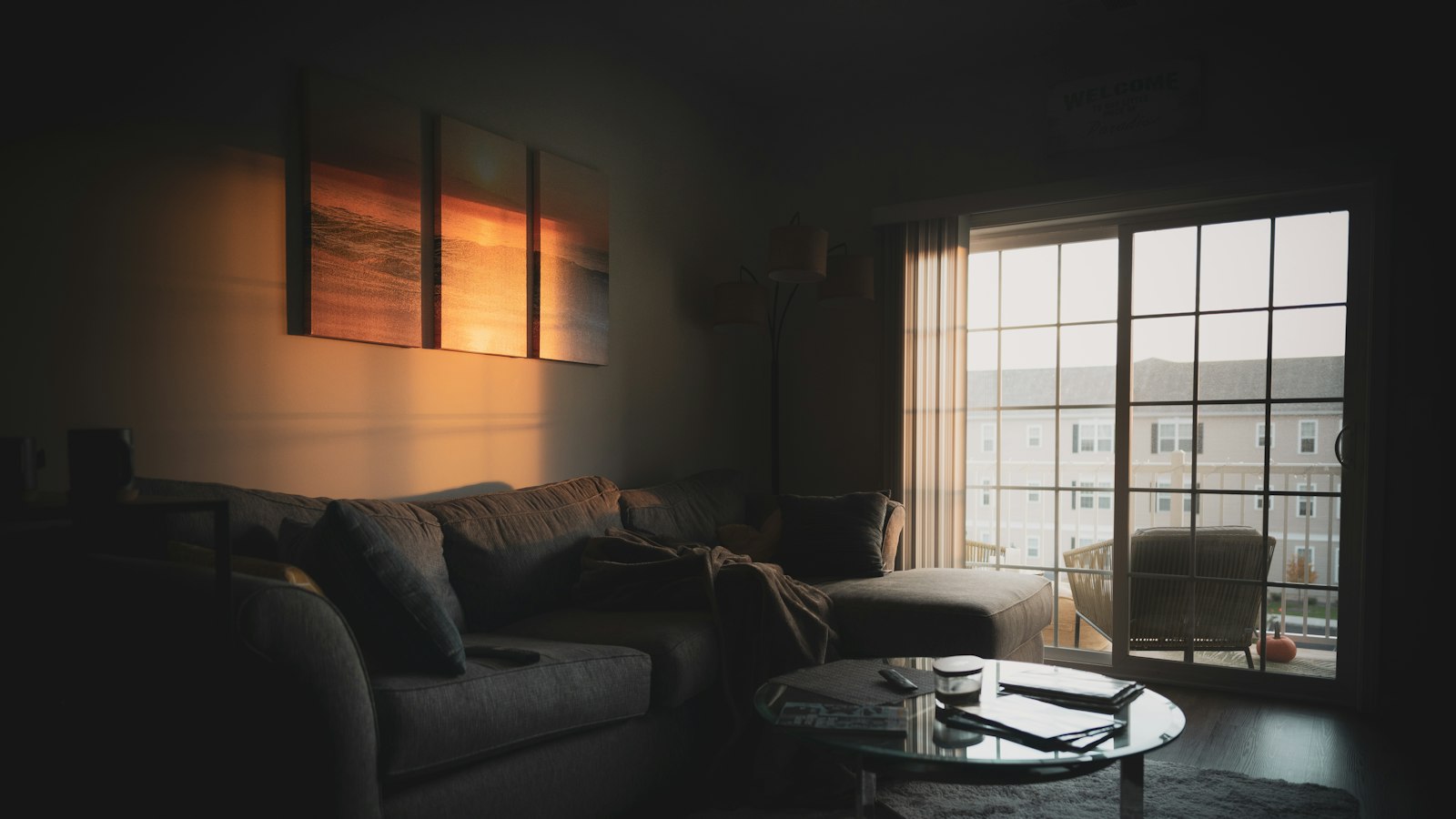 A dimly lit living room at dusk where the heating is the biggest energy cost